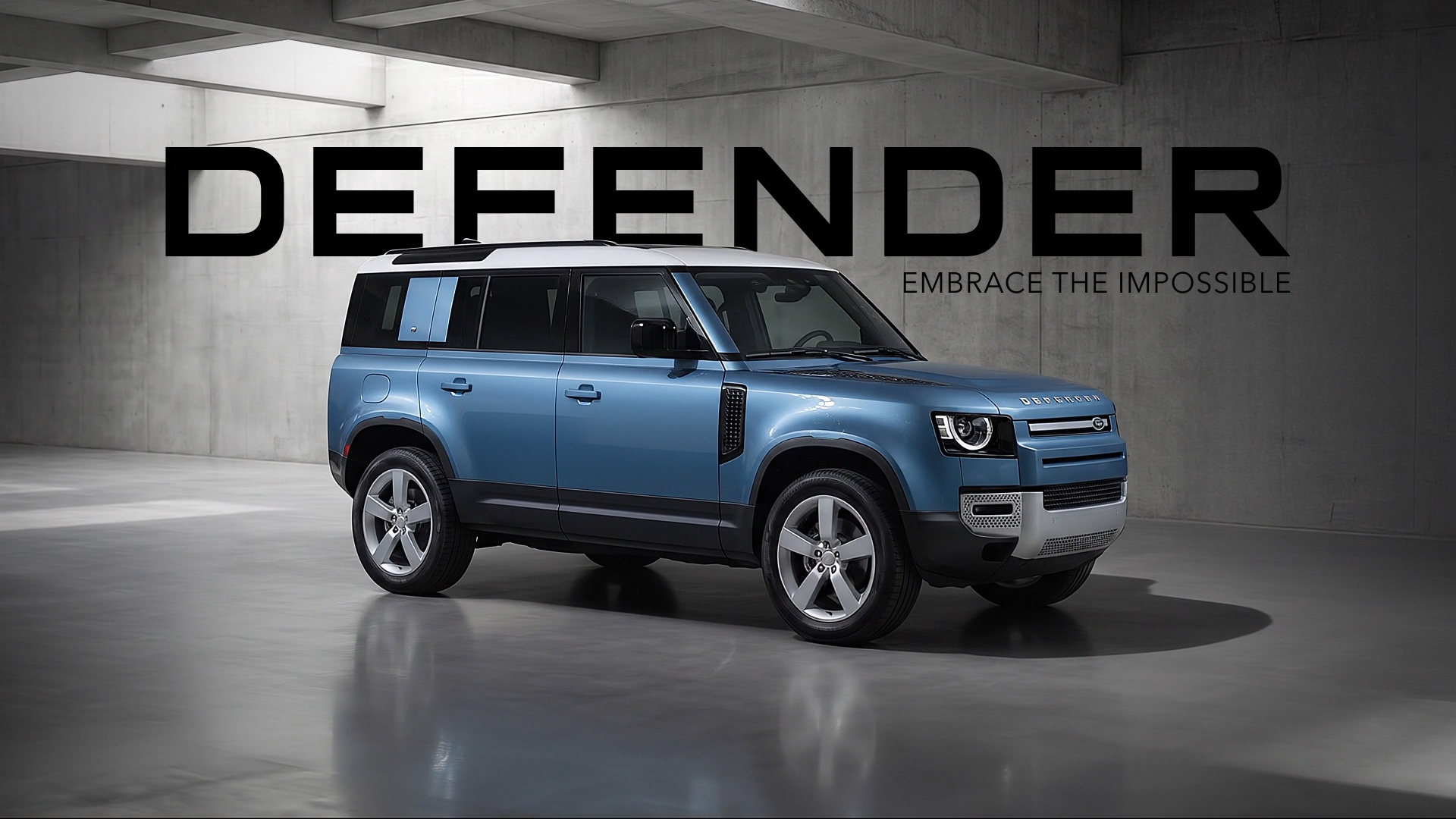 A blue Land Rover Defender SUV is parked in a modern concrete showroom. Bold "DEFENDER" text above highlights the vehicle's rugged elegance.